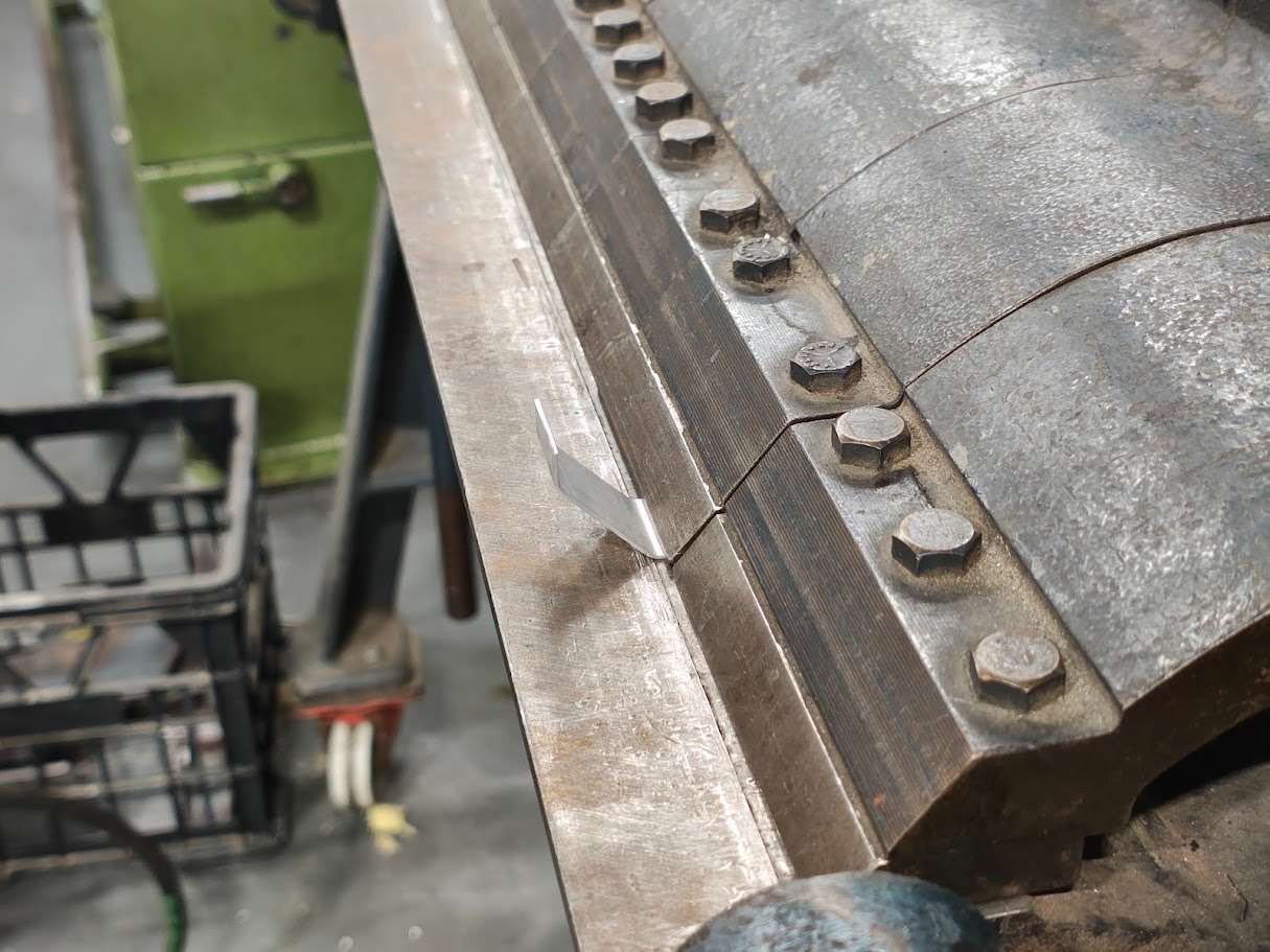 Sheet metal folding landing gear strut
