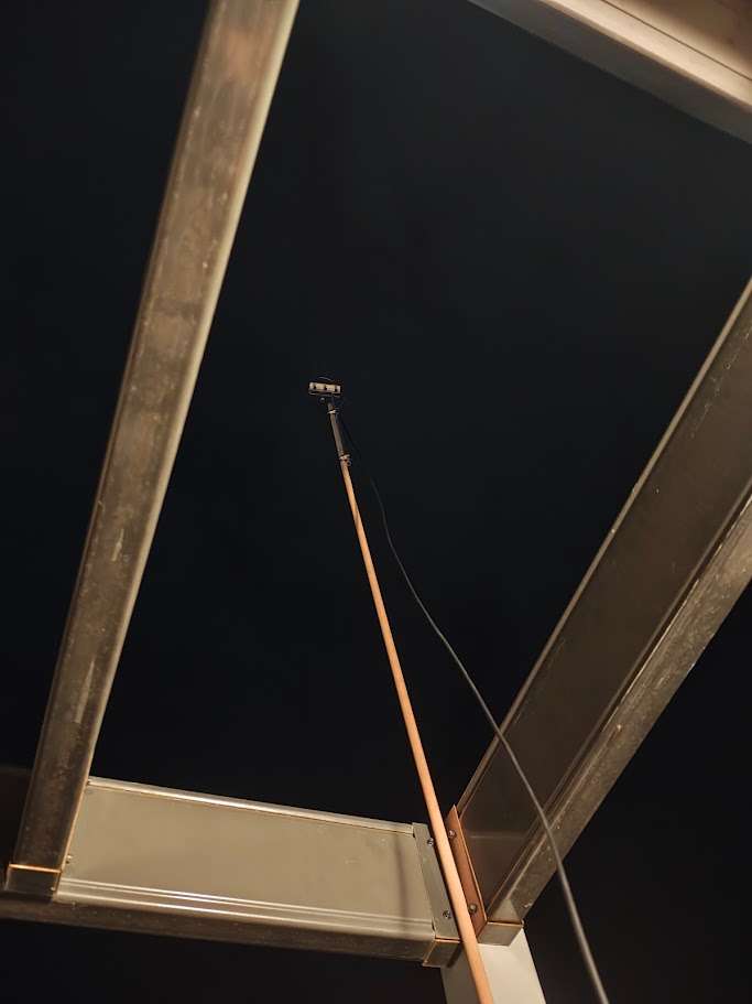 Antenna mounted above roof